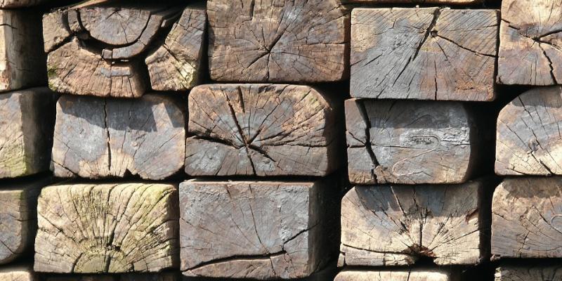 Stacks of railroad ties. Interstate Pest Management serving Portland OR & Vancouver WA talks about why carpenter ants aren't carpenters.